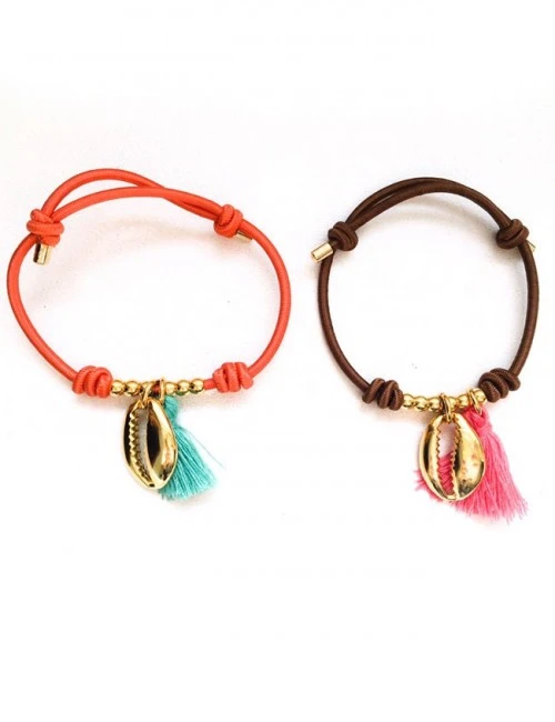 pulsera elástico de colores con bolitas y concha doradas