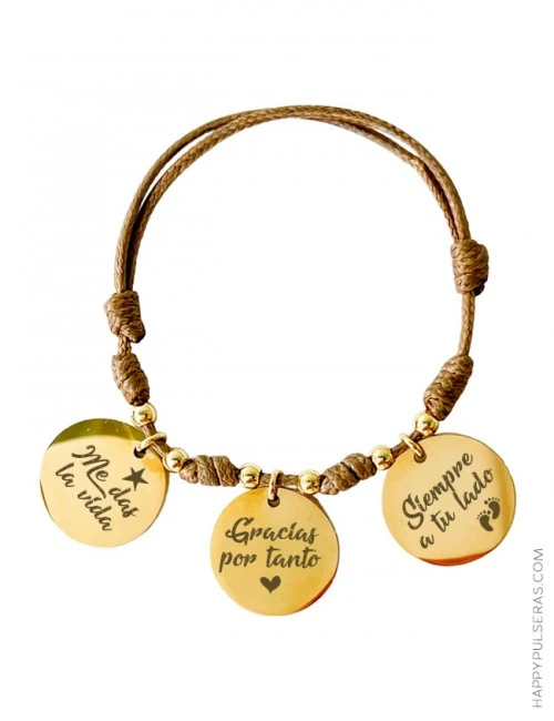 Pulseras con medallas con tus mensajes grabados, nosotros le damos forma a tu texto.